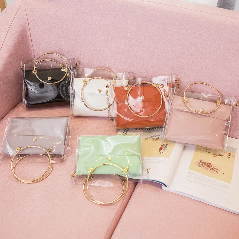 

Trendy Bag 2019 New Personality Women's Bag Hardware Hand Chain Mother Cell Bag PVC Transparent Bag pink bag clear bag