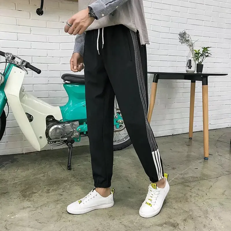 

Autumn Fashion Athletic Pants Men's Loose-Fit Casual Fashion Men Beam Leg Stripes Skinny Closing Harem Pants Trousers