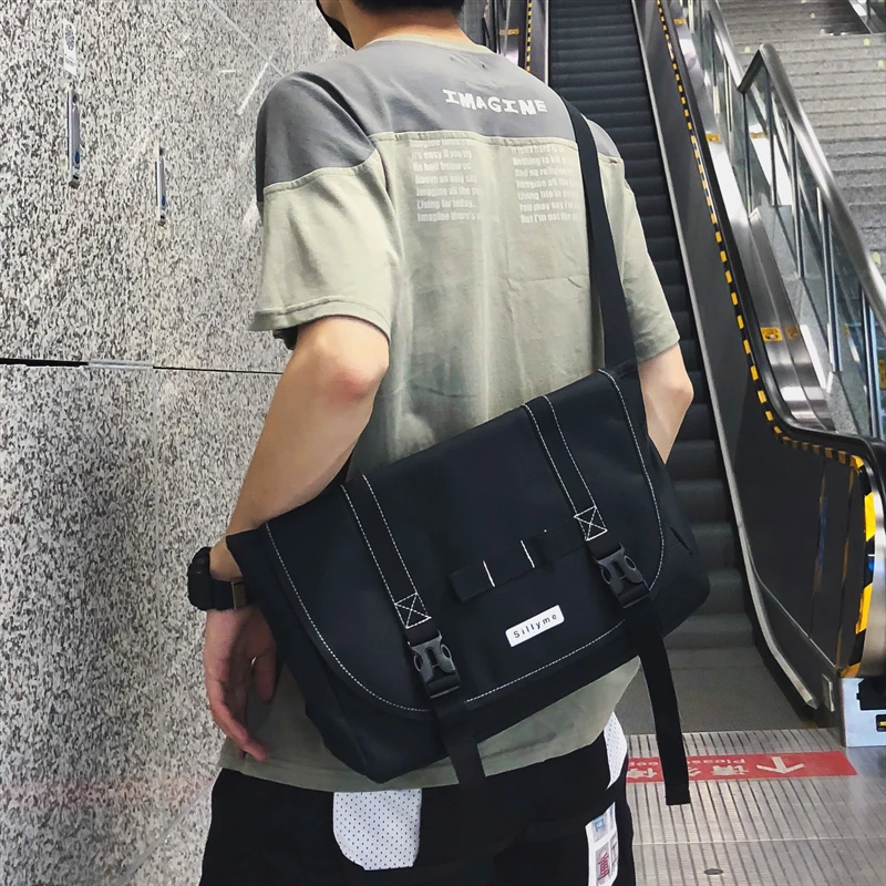 

Brand Design Workwear bag messenger bag canvas men's tide brand Japanese students shoulder slung messenger bag version of Joker