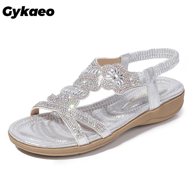 Женские босоножки на плоской подошве Gykaeo серебристые/золотистые вечерние со
