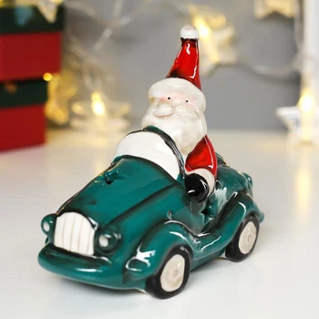 

Souvenir ceramics light "Santa Claus in a red outfit on a green car" 13.5x8x14 cm 4886388