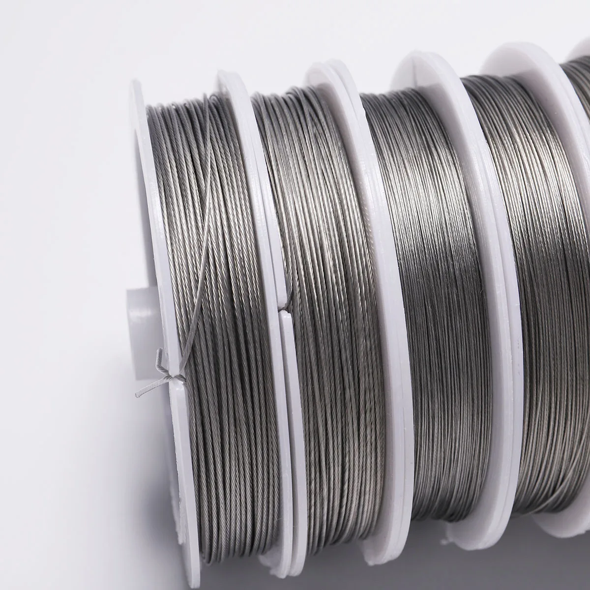 

1 Roll/lots 0.3/0.45/0.5/0.6mm Resistant Strong Line Stainless Steel Wire Tiger Tail Beading Wire For Jewelry Making Finding