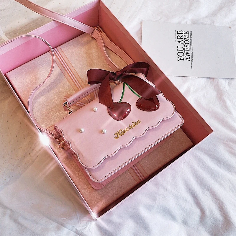 

New girl cute little bag of 2019 Japanese lolita lolita cherry bowknot aslant single shoulder bag