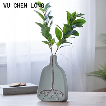 

WU CHEN LONG Ceramic Vase Statue Creative Living Room Simulation Flower Arrangement Nordic Style Home Decor Sculpture A2256