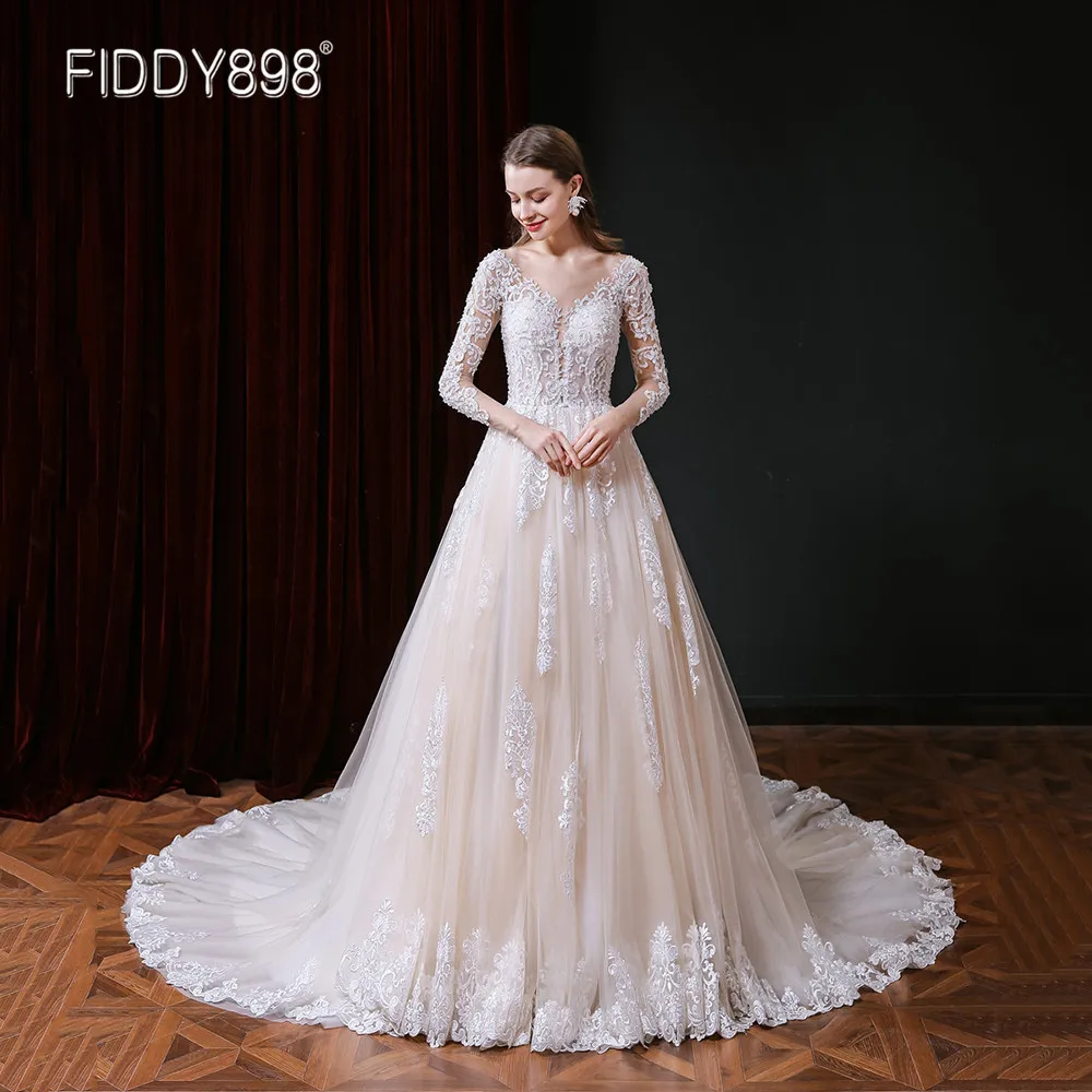 

Champagne Elegant Wedding Dress 2020 Scoop Lace Long Sleeves Bride Gown for Women Bohemian Beaded Court Train Bridal Dresses