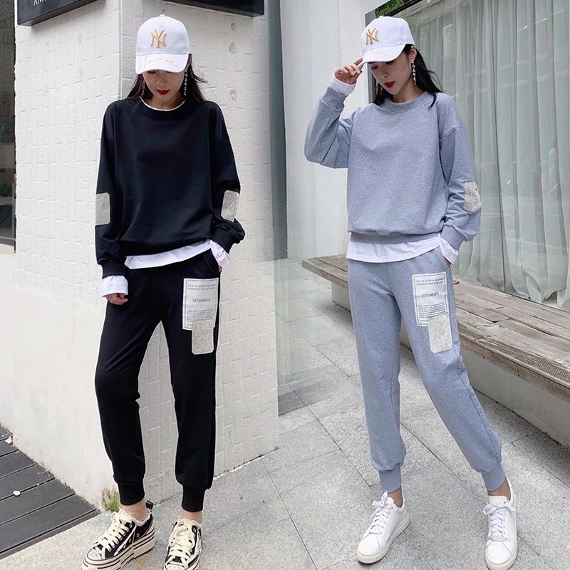 

Make the new Europe early autumn heavy hot drilling han edition and false two thin fleece casual dress tide female