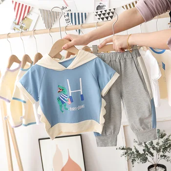 

Children's suit new boy leisure middle and small children's dinosaur cartoon hooded sweater short-sleeve shorts two-piece suit