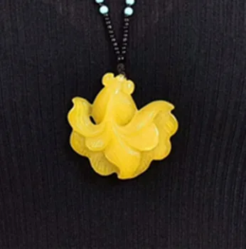 

Natural yellow yu carving three dimensional Fish Pendant FREE rope