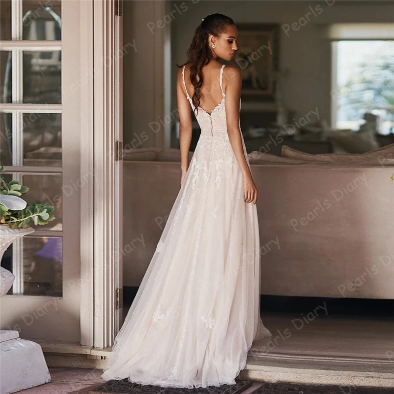 Jiayigong-Sexy-Lace-Wedidng-Dress-2020-V-Neck-Sleeveless-Applique-Flowers-Backless-Tulle-Robe-De-Mariee.jpg_Q90.jpg_.webp (1)