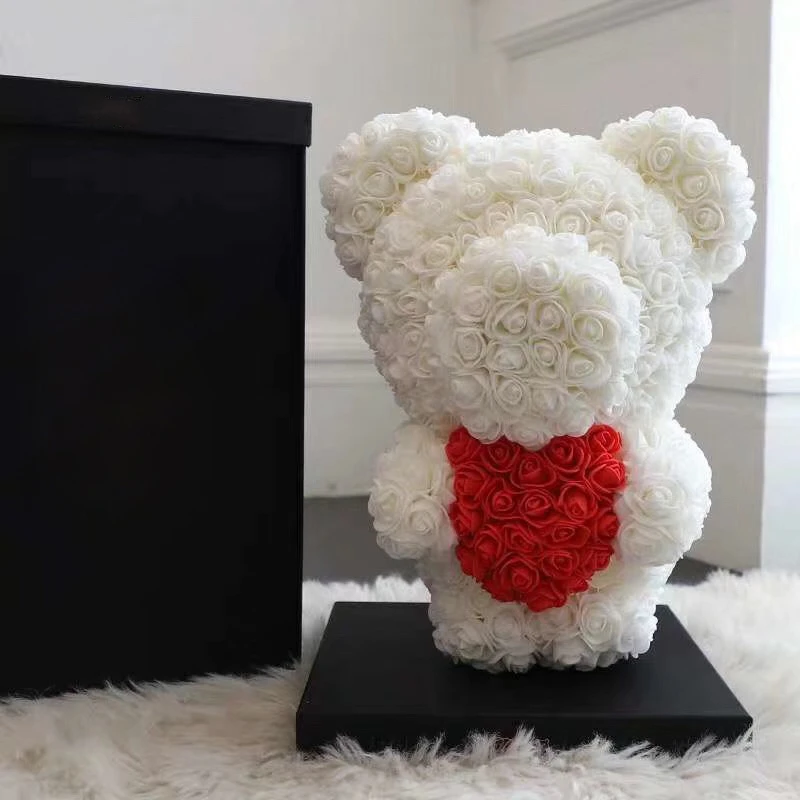 big teddy bear and roses
