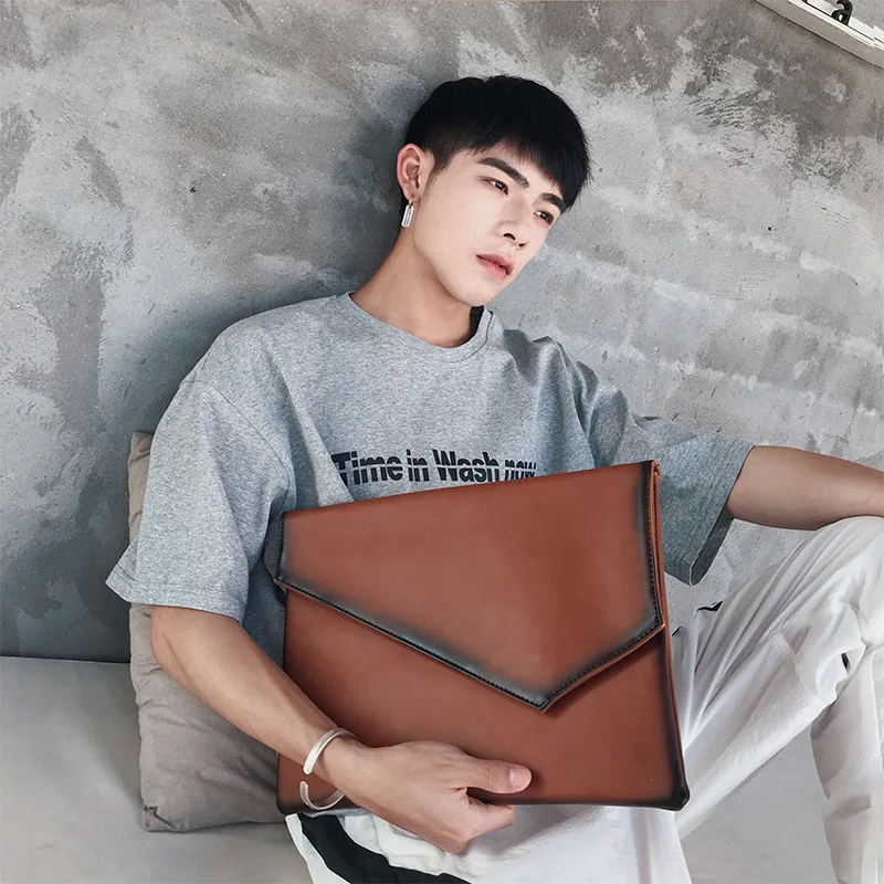 

Q clutch bag iPad file bag Korean version of stylish men retro envelope bag leather street bag