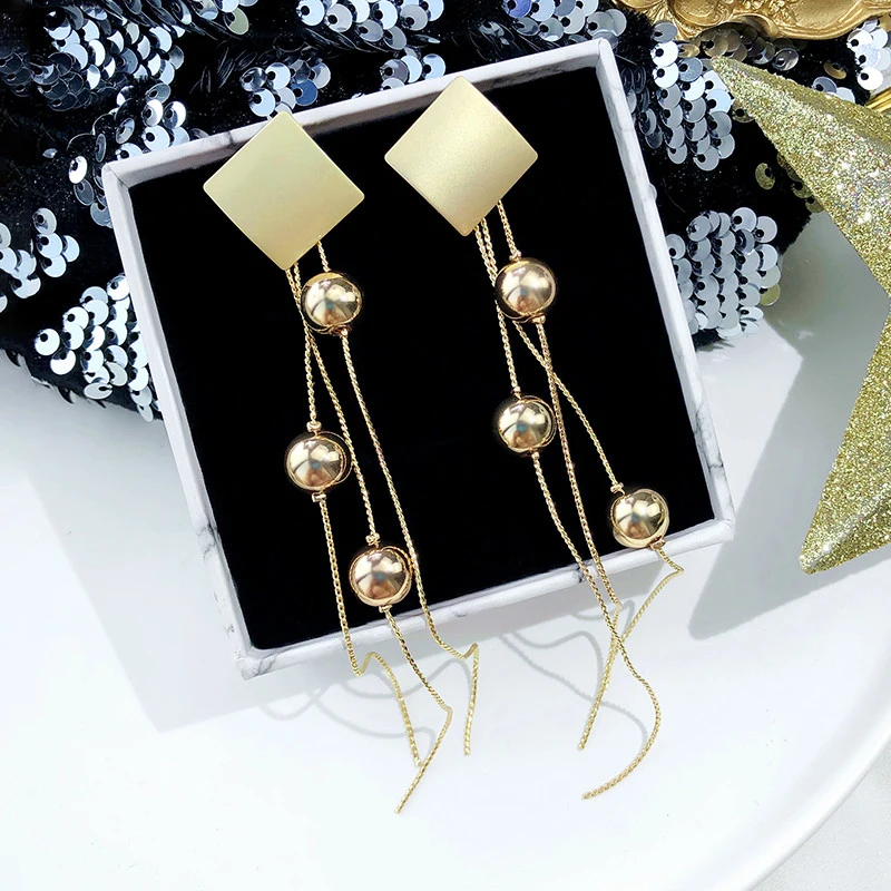 

Net red temperament long tassel earrings female European and American exaggerated earrings for round face earrings