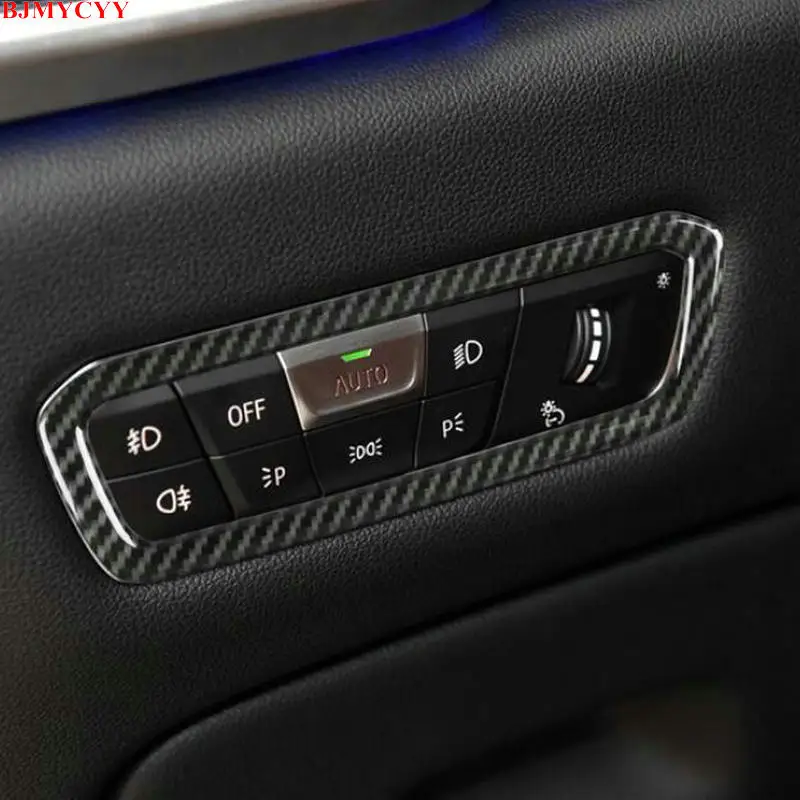

BJMYCYY Automobile headlamp switch panel carbon fiber decorative frame for BMW X5 X6 X7 2019 2020