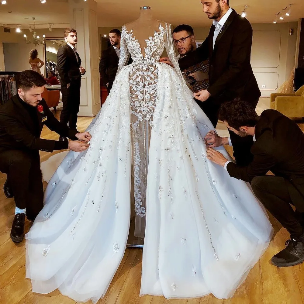 African Overskirts Wedding Dresses Sheer Neck Lace Beaded Sheath Bridal Dresses See Through Long Sleeves Wedding Gowns Dubai