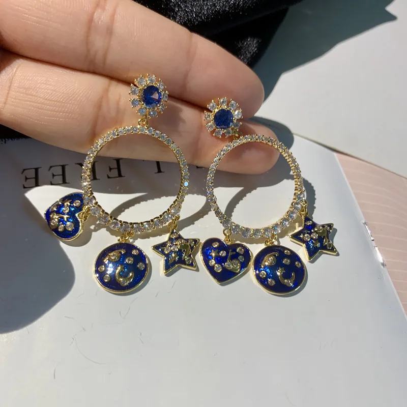 

big cz circle with blue heart and star charm drop fashion earrings for women
