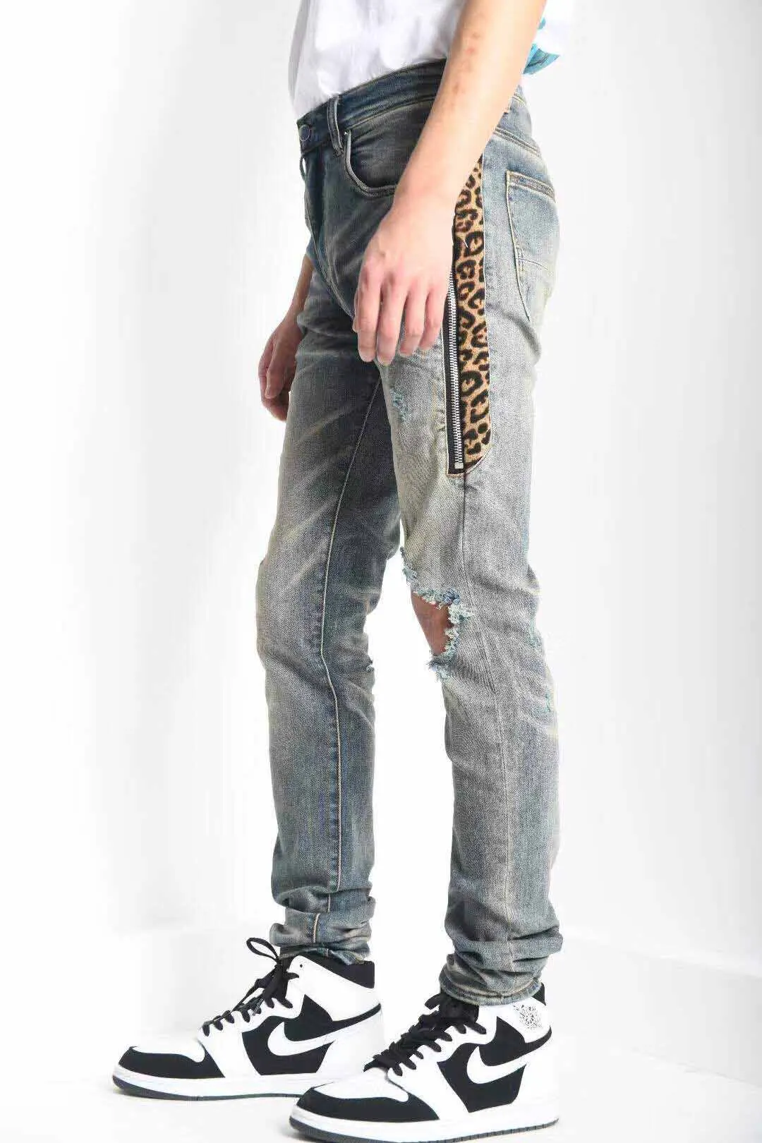 distressed track denim jeans