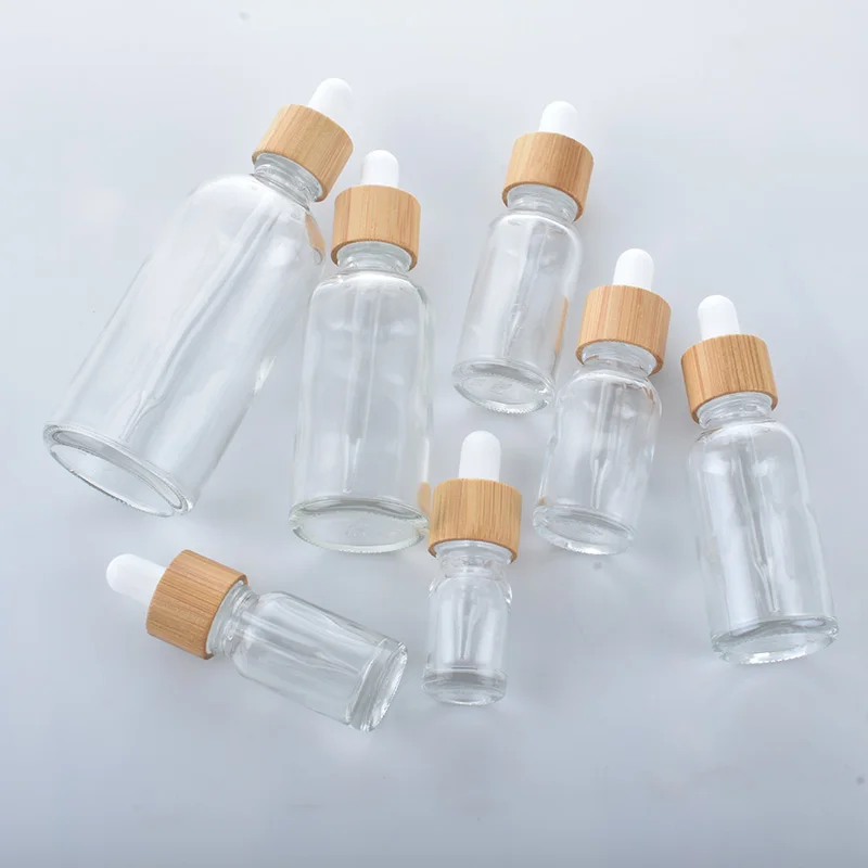 5ML-100ML Hot Sale Custom Glass Essential Oil Dropper Bottles For Cosmetic Skin Care Pipette Container Packaging With Bamboo Lid