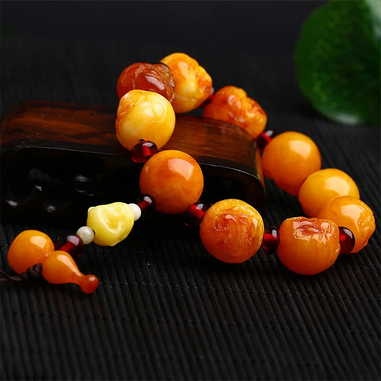 

Natural amber bracelets men and women hand-carved amber bracelet women's amber raw chicken yellow christmas bracelet