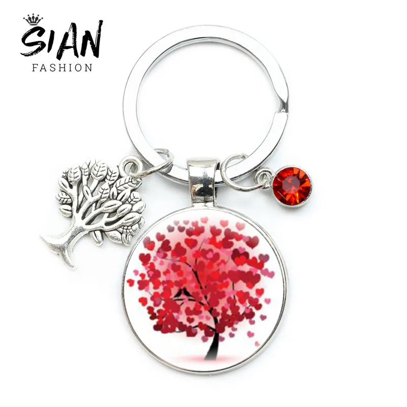 BEAUTIFUL PINK/PURPLE COLOURED TREE OF LIFE  GLASS DOME KEYRING 