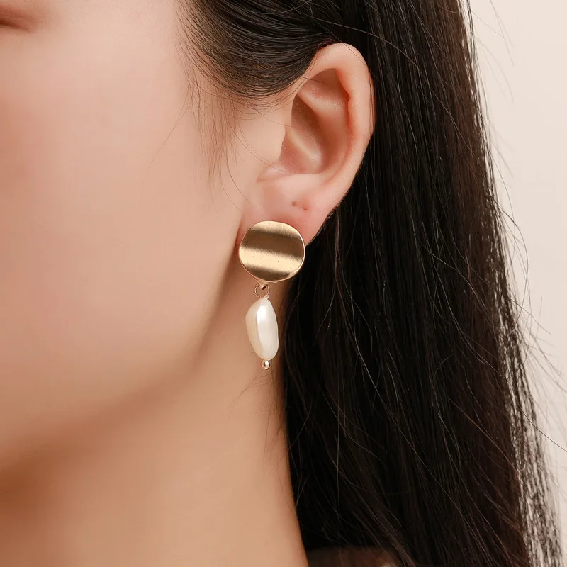 

Korean Simple Earring Personality Pearl Wave Mirror Stereo Earrings Indian Earrings