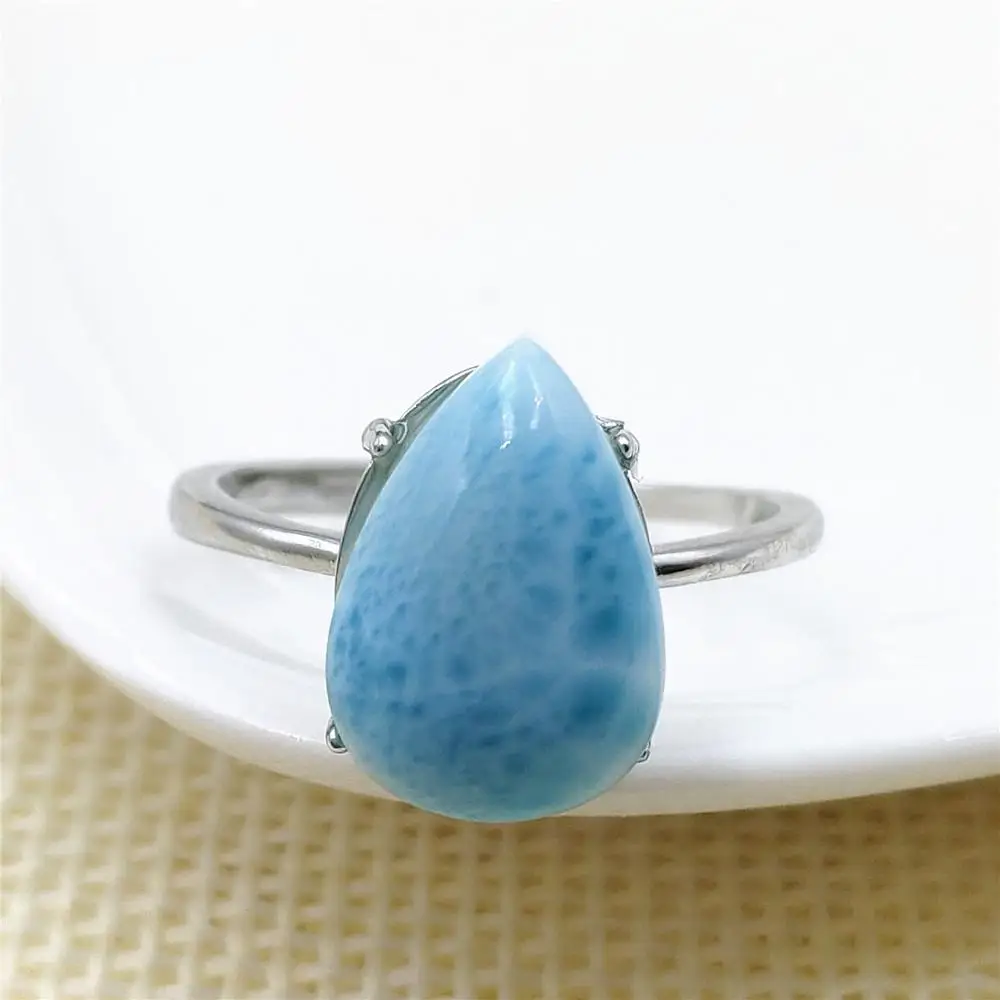 

From Dominia Natural Blue Larimar Adjustable Ring 14x10mm Water Pattern Oval 925 Sterling Silver AAAAAA