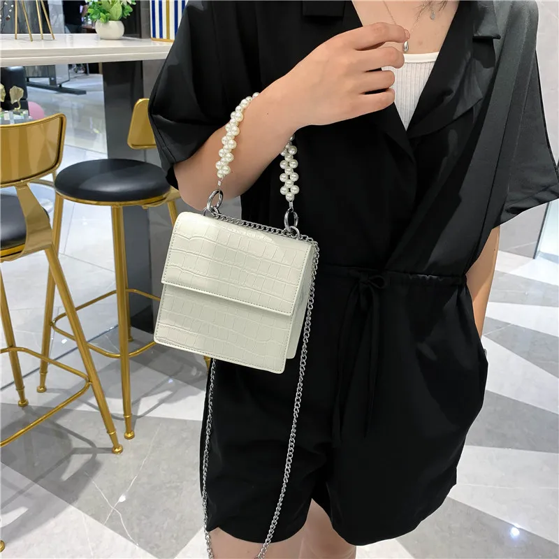 MINI bolsos cruzados de cuero PU con mango de perla para mujer, bolso de  hombro con cadena dulce 2020, bolsa cruzada de viaje para mujer -  AliExpress Maletas y bolsas