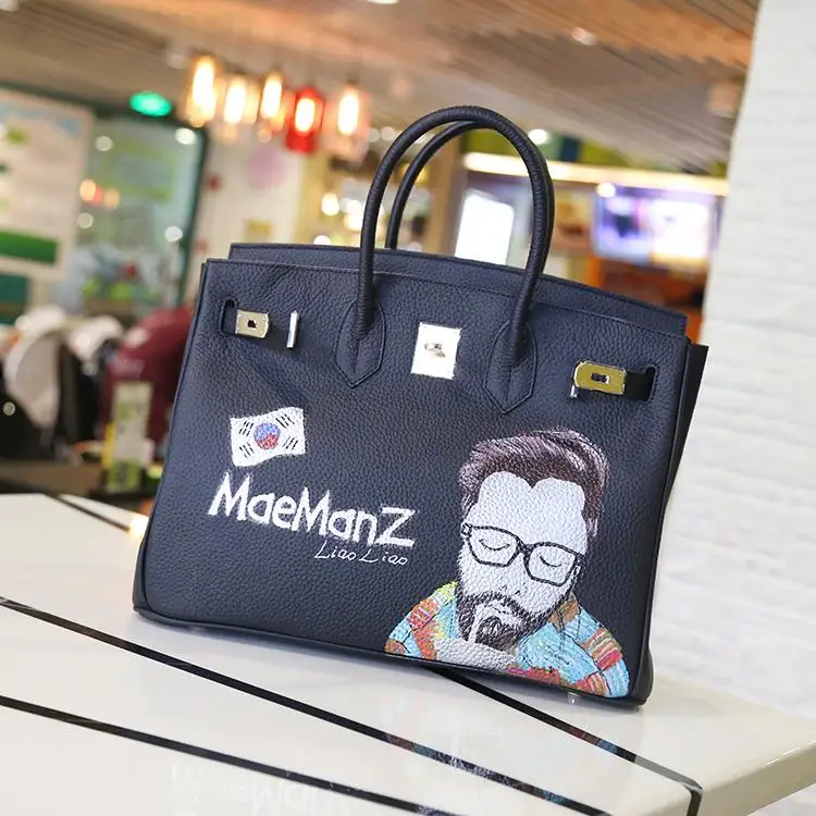 

Korea Style hand-drawn graffiti platinum top-handle bags cowhide Leather bag portable female bag Graffiti bag