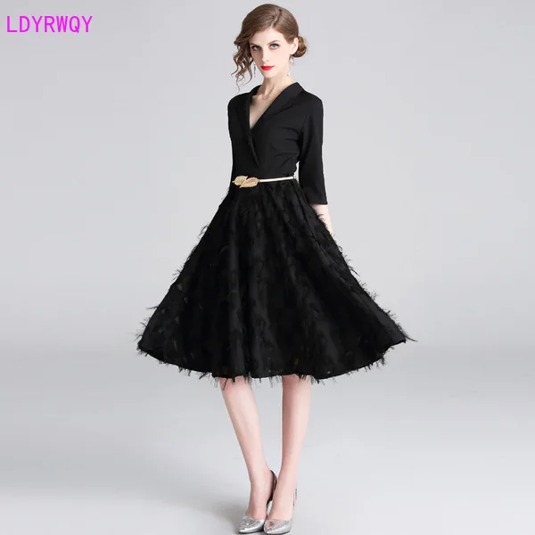 

2019 autumn and winter new European and American women's temperament tassel lapel five-point sleeve stitching A-line dress