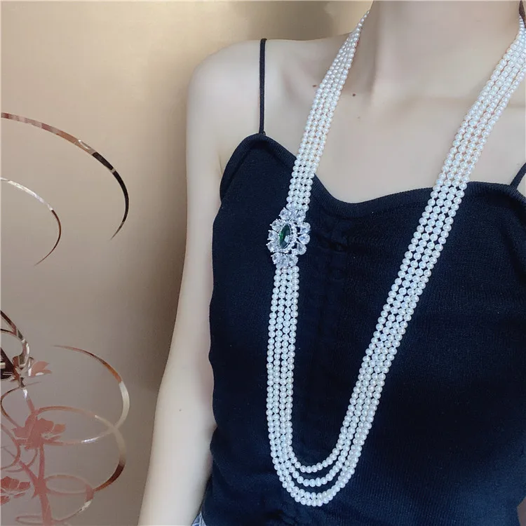 

Hand knotted 85-95cm sweater chain 4strands 4-5mm white freshwater pearl micro inlay zircon accessories pearl pendant necklace