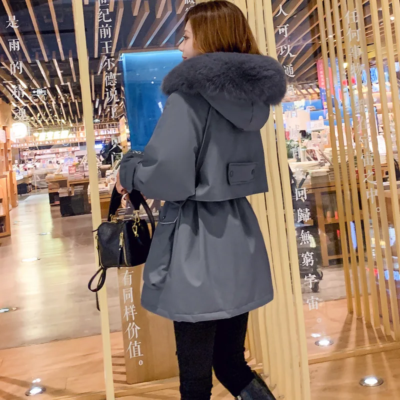 Стиль белый утиный пух Dongdaemun пуховик Женская рабочая одежда средней длины приталенное плотное модное пальто на липучке