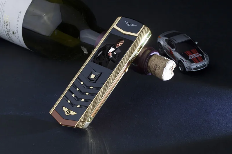 Бесплатный подарок, кожаные сумки V9 Meatl Body, роскошный барный телефон, две sim-карты, Bluetooth, набор номера, для старшего мобильного телефона, Невидимая клавиатура
