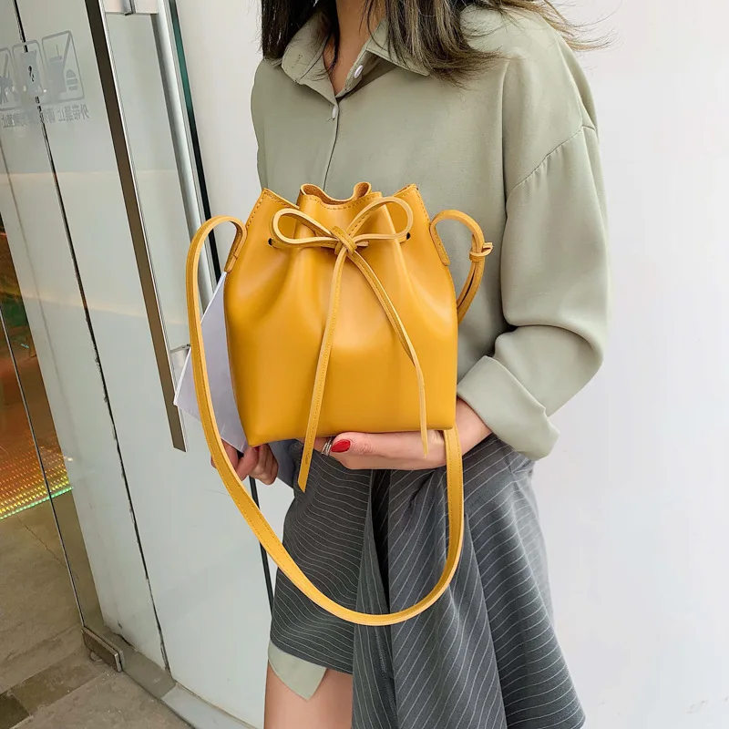 

Women 2019 spring and summer new Chaohan version of butterfly knot oblique satchel simple fashion single shoulder bucket bag