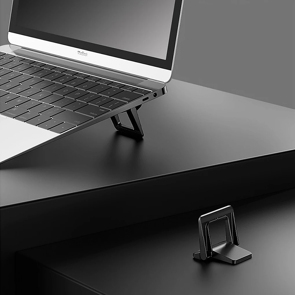Aluminium Portable Impact Folding Stand for Tablets Universal Smallest and Easy to Carry Around Mini Tablet Stand. Phones laptops Invisible Laptop Stand Aluminium Portable Impact Folding Stand for Tablets Universal Smallest and Easy to Carry Around Mini Tablet Stand. Phones laptops Invisible Laptop Stand