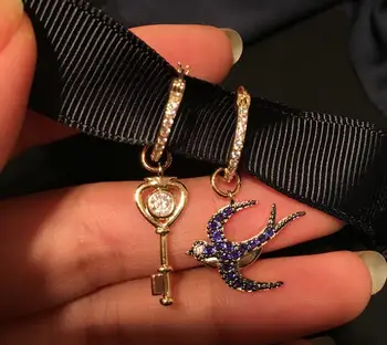 

Fashion trendy women zircon earrings asymmetric key swallow personality ear accessories