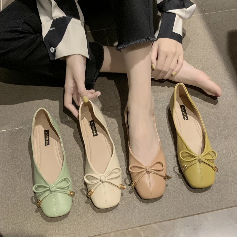 

2020 spring autumn ladies flat shoes casual wild solid color simple cross strap fashion shallow mouth loafers women W38-63