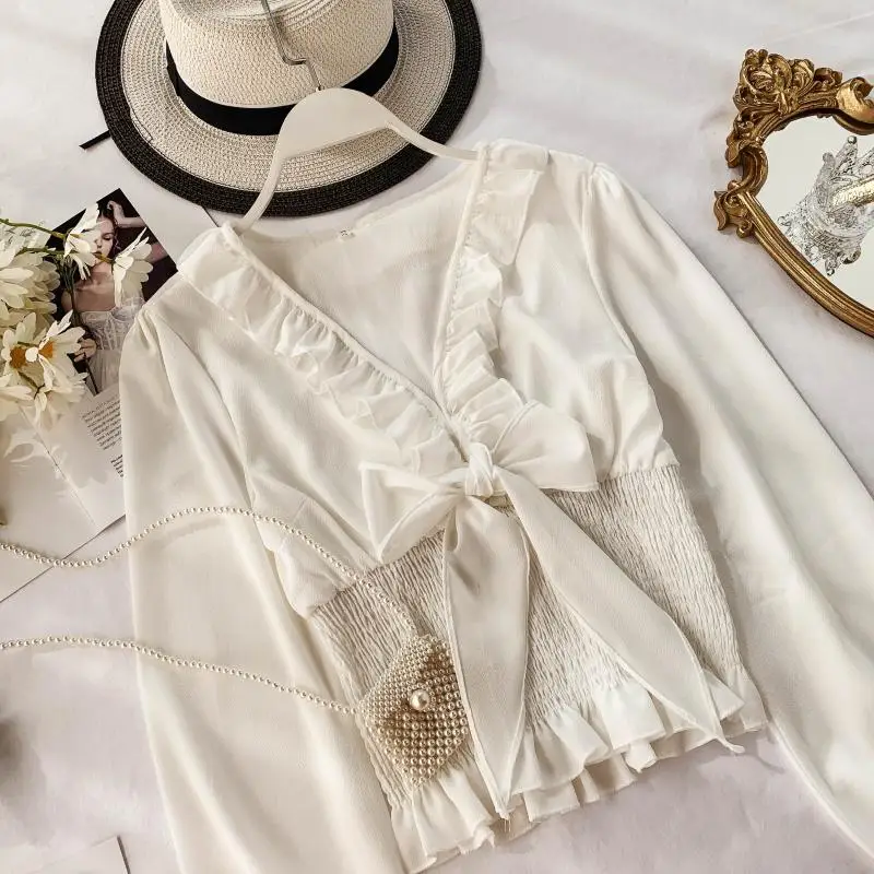

2019 new fashion women's Chiffon shirt female sweet wood ear V-neck hollow belt with waist thin and thin section