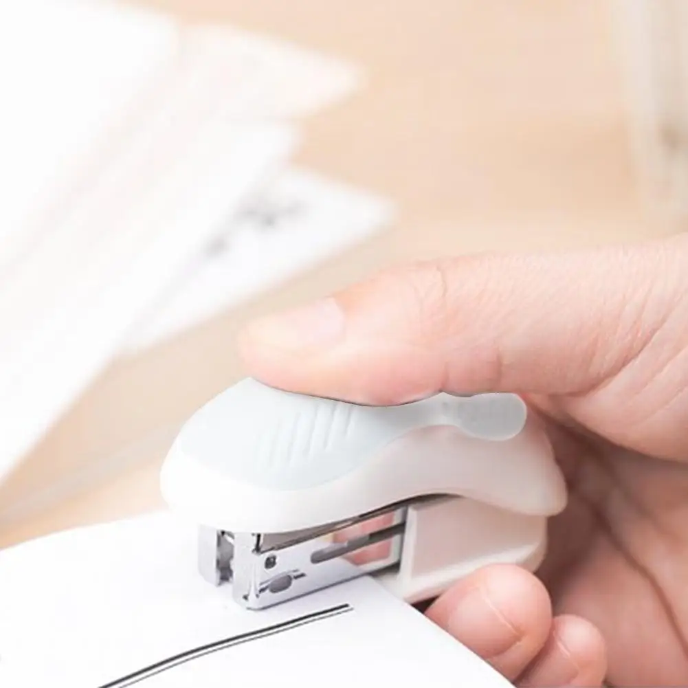 

Deli Metal Cute Mini Paper Stapler Binding Binder Stapless Stationery Supplies School office Practical Stapler