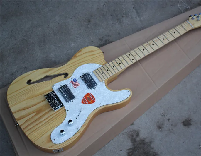 

Factory direct for the classic F hole 6 string electric guitar, elm body, wood natural color, support custom, multi color option