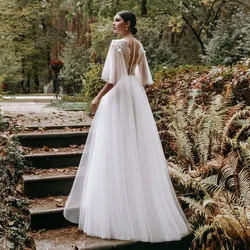 Sumnus Bohemian Wedding Dresses Boho Deap V Neck Short Sleeve Wedding Gown Pearl Buttons Beach Bridal Gowns