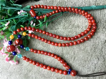 

Natural nine south sichuan red agate persimmon flame grain sweater chain hanging on the rope. Amazonite beeswax