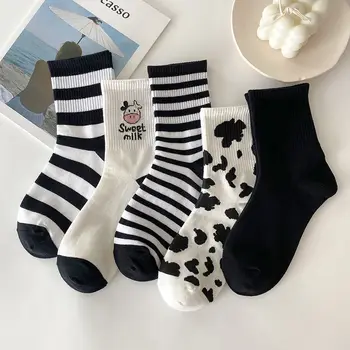 

Black and white cow socks women's tube socks tide autumn and winter Korea cute Japanese solid color stripes wild Novelty Socks