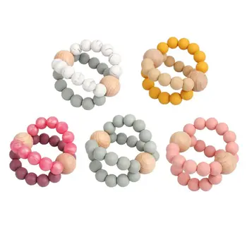 

2020 Baby Silicone Teethers Beech Wood Teething Wooden Ring Baby Sensory Rattles Toys