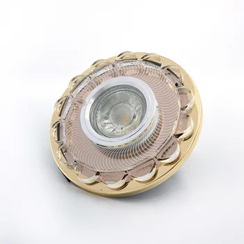 

Chrome and gold color round crystal downlight recessed lights with LED bulbs used for kitchen and interior decoration.