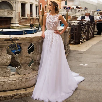 

Eightree A Line Wedding Dresses Elegant O Neck Lace Appliques Beach Boho Bride Dress Illusion Backless Wedding Gowns