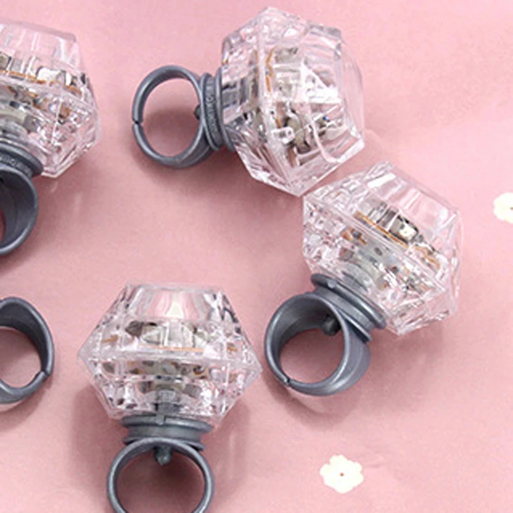 Novelty-LED-Glowing-Diamond-Finger-Ring-Flashing-Light-up-Toys-Kids-Birthday-Gift-Wedding-Party-Supplies.jpg_Q90.jpg_.webp