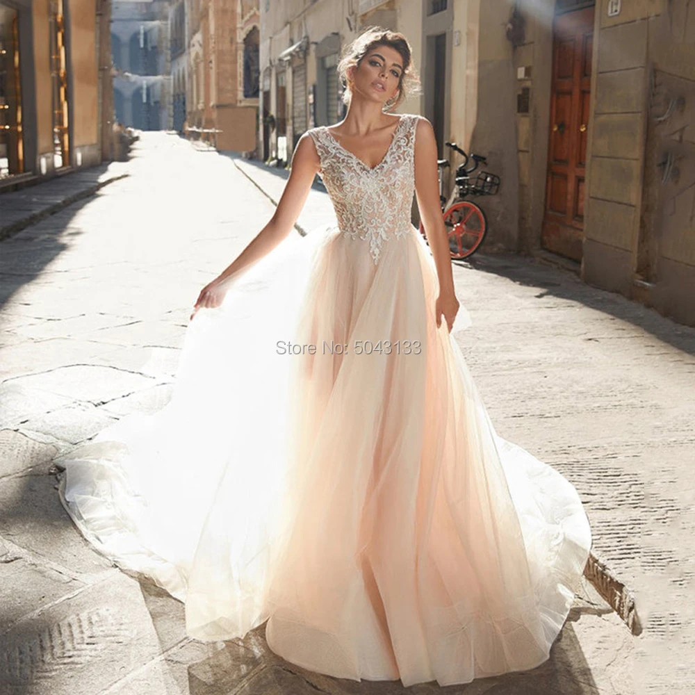 

Exquisite Charming Wedding Dresses 2020 Chic Lace Appliques V Neck Backless Floor Length Tulle Bride Wedding Dress Sleeveless