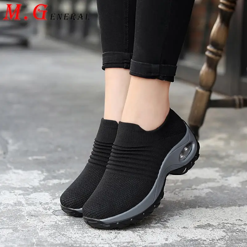 black flat trainers womens