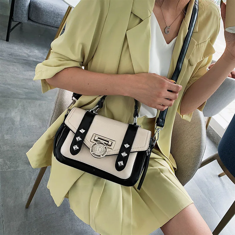 

New 2019 punk - style black - and - white one - shoulder oblique satchel