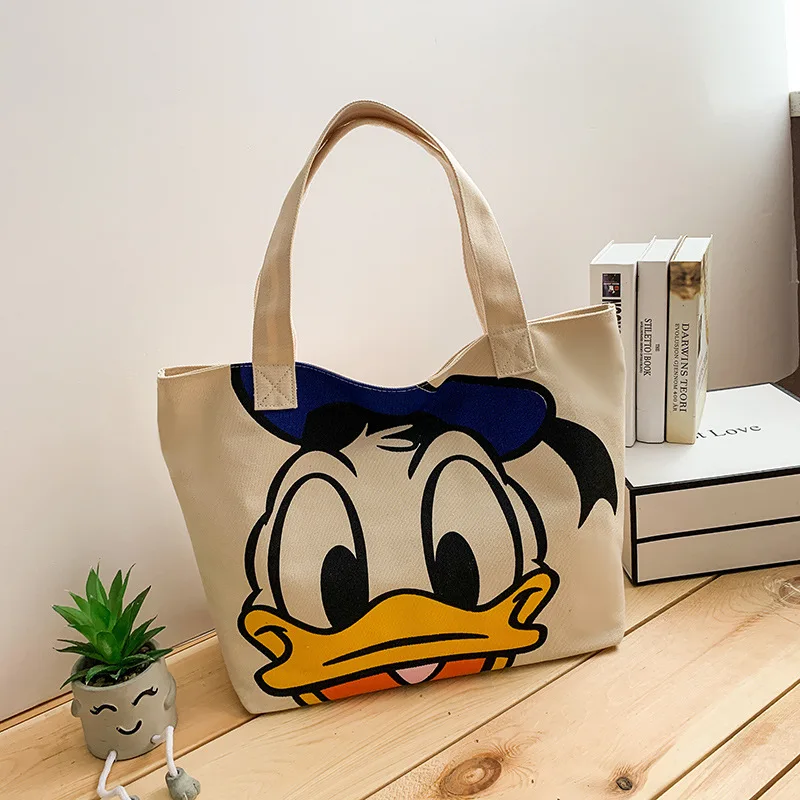 Disney Mickey Mouse Large Capacity Canvas Bag Female Cartoon Minnie One  Shoulder Donald Duck Daisy Handbag Student Tote Bag Gift - Shopping Bags -  AliExpress