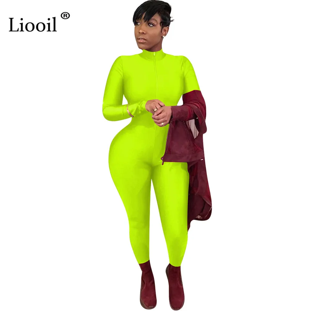 green zip up jumpsuit